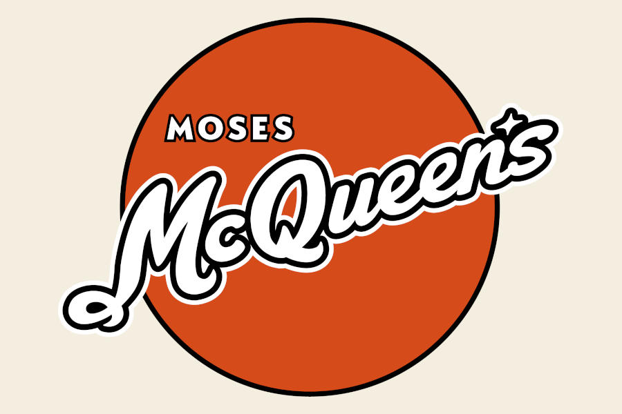 Logo of Moses McQueen’s featuring a bold white script over a large orange circle on a light background.