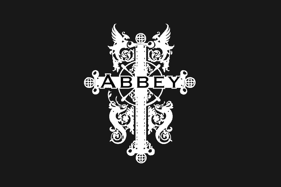 Logo of The Abbey Food & Bar featuring an ornate cross-shaped design against a solid black background.