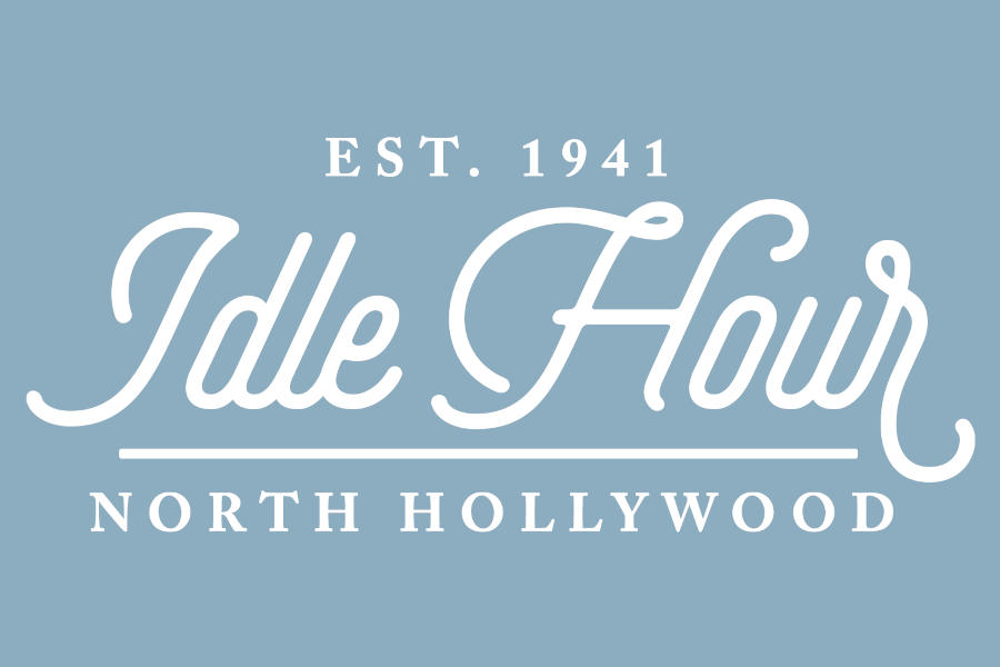 Logo of Idle Hour Bar in vintage white script on a light blue background, with Est. 1941 above and North Hollywood written underneath.
