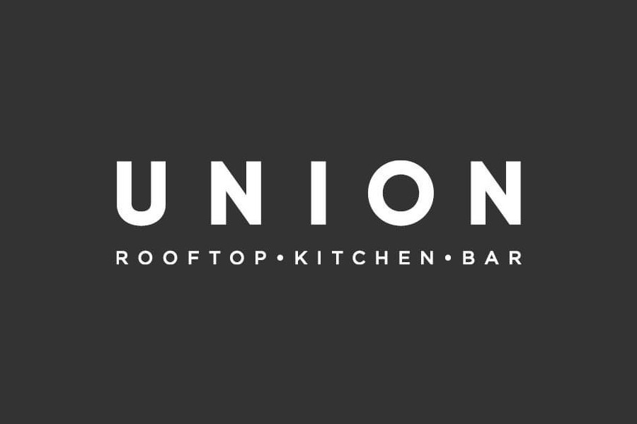 Logo showing “UNION” in capital white letters with subtext “ROOFTOP • KITCHEN • BAR”.