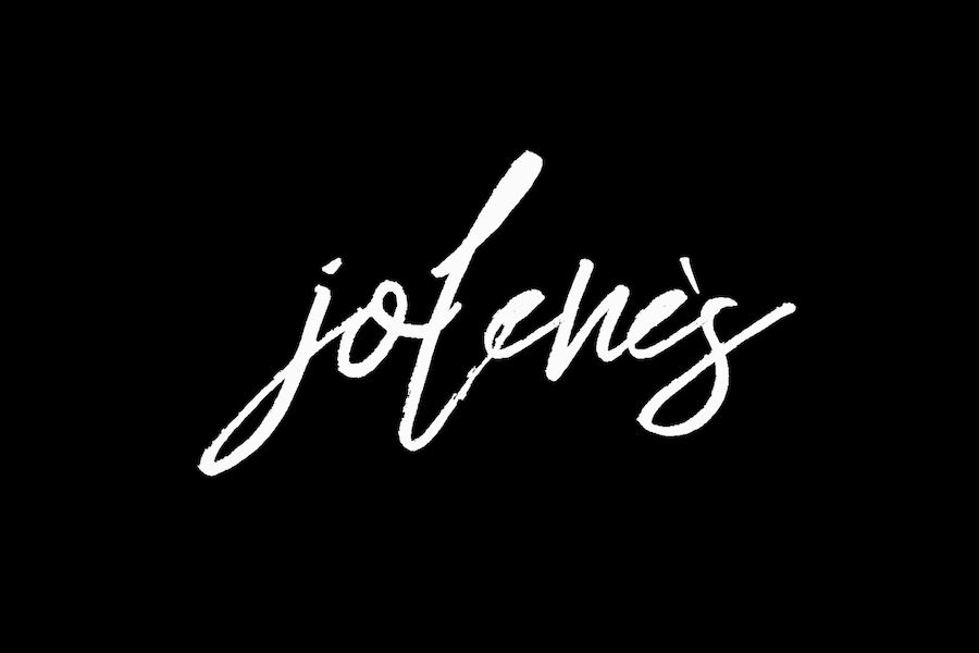 Logo of Jolene’s in white handwritten-style lettering displayed on a black background.