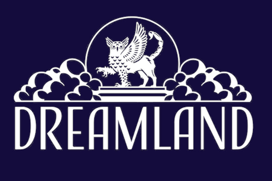 Logo of Dreamland featuring a white winged mythical creature above the word Dreamland on a dark blue background.