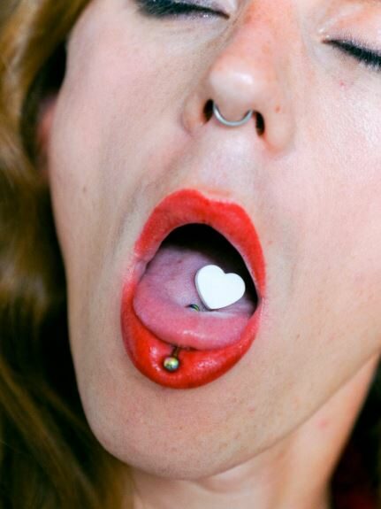 a woman taking a pill
