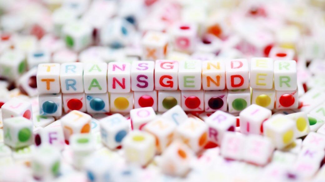 letters of Transgender word on small cubes